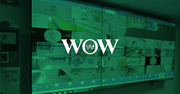 在葡萄牙葡萄酒世界的安全运营控制室，视频墙显示了由Userful平台管理的实时摄像机画面，并带有绿色覆盖和标识。